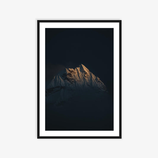 Ama Dablam emerging through the clouds