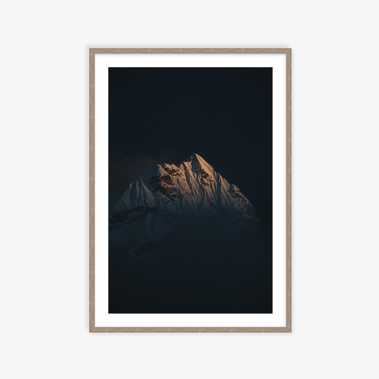 Ama Dablam emerging through the clouds