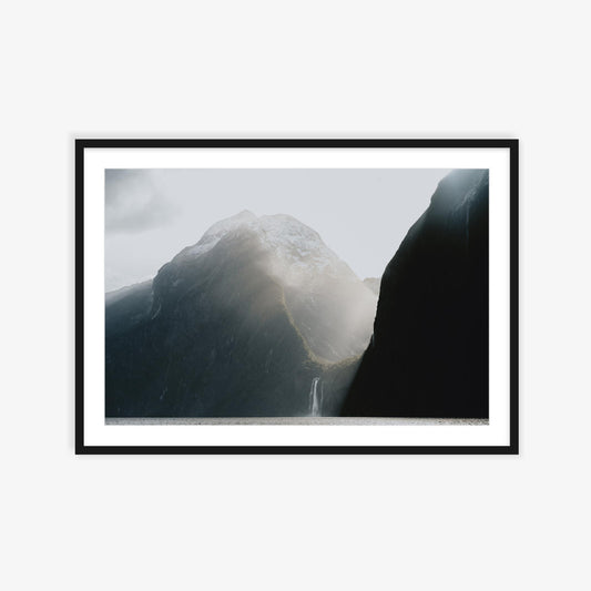 Burst of sunlight into Milford Sound