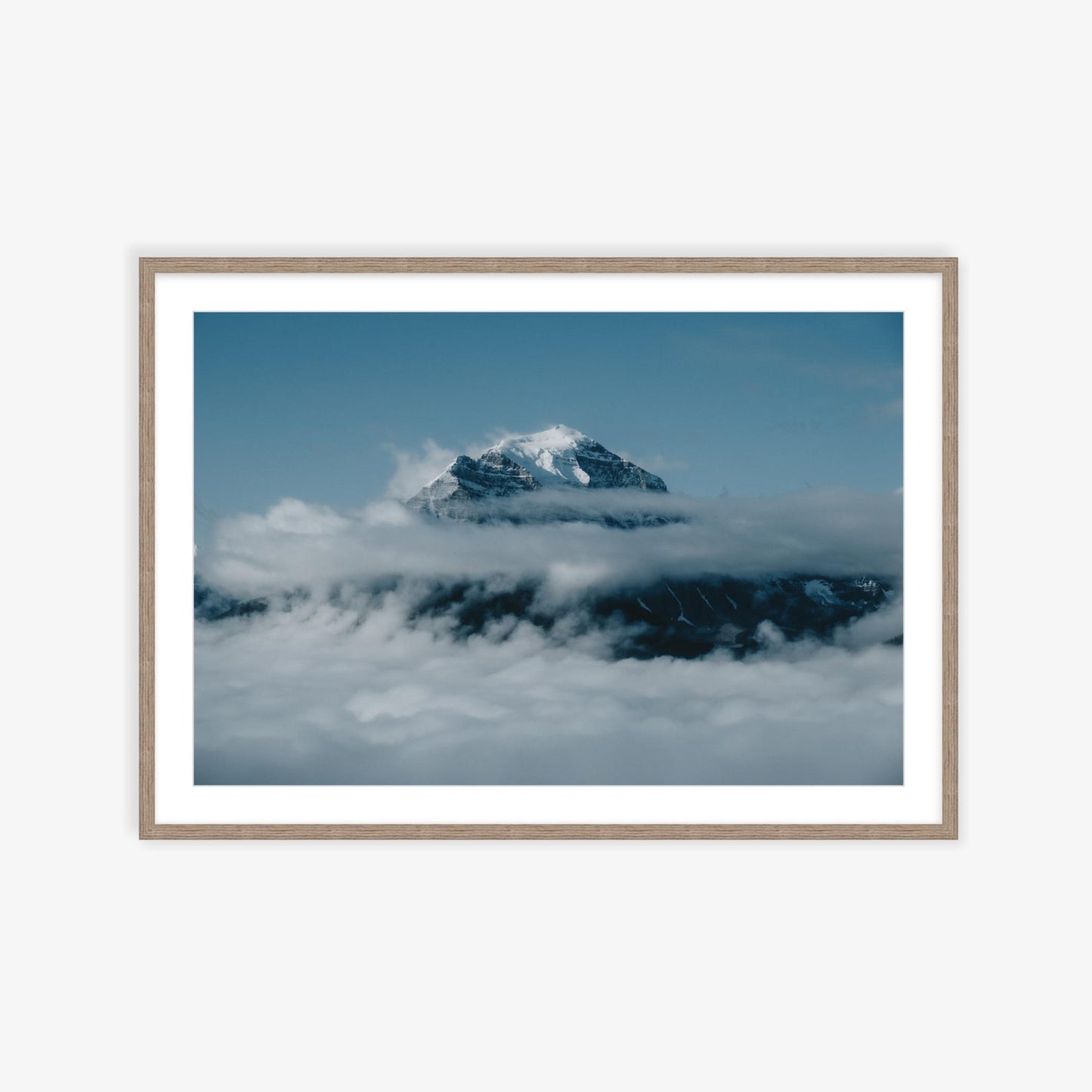 Mount Temple over the clouds