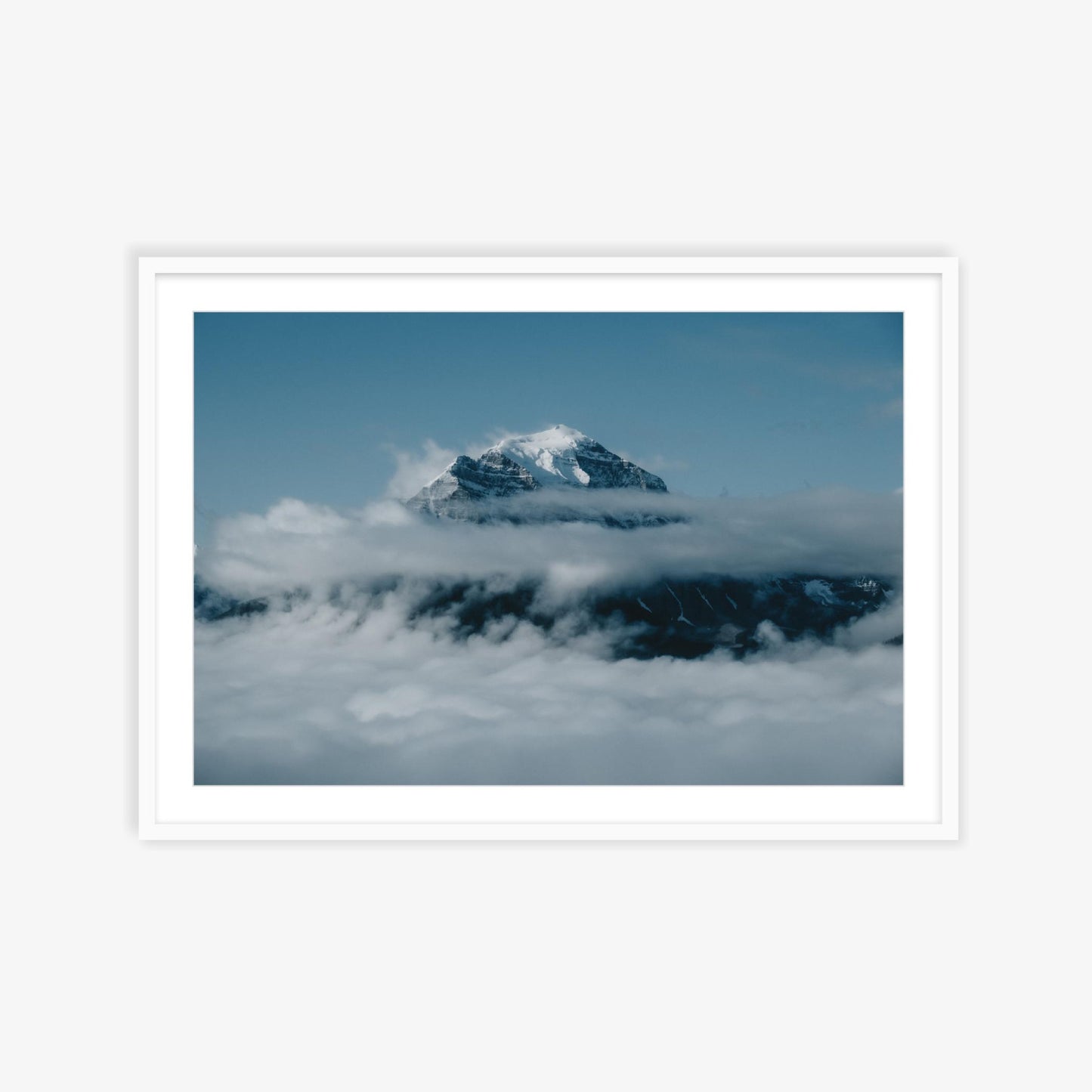 Mount Temple over the clouds